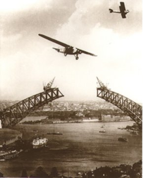 Plane flying over Sydney Harbour Brige