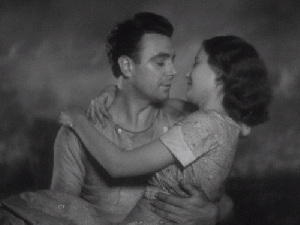 George Brent and Stanwyck