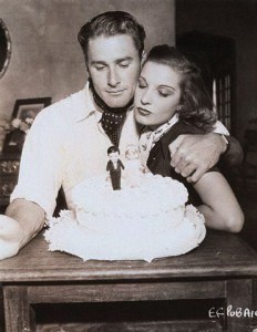 Original caption: Errol Flynn and his first wife, the French film star Lily Damita. ca. 1935
