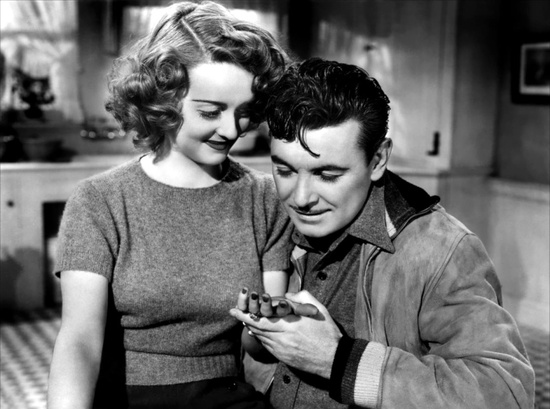 George Brent and Bette Davis